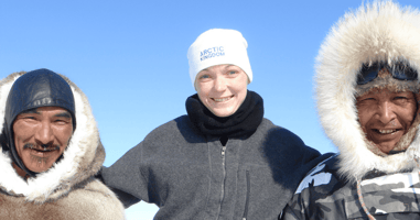 An Arctic Kingdom traveler with Inuit guides