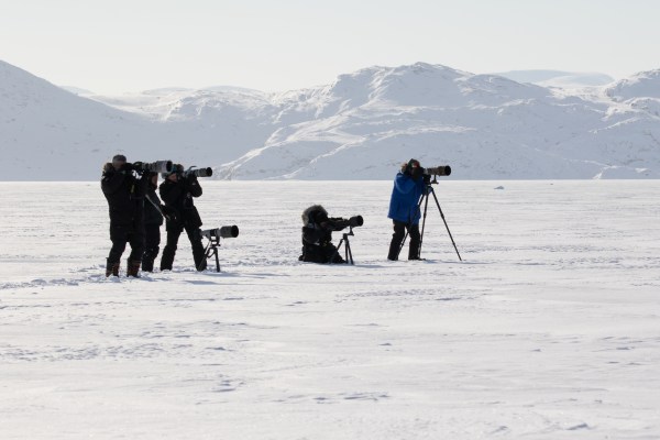 Photographers taking pictures during Arctic tour