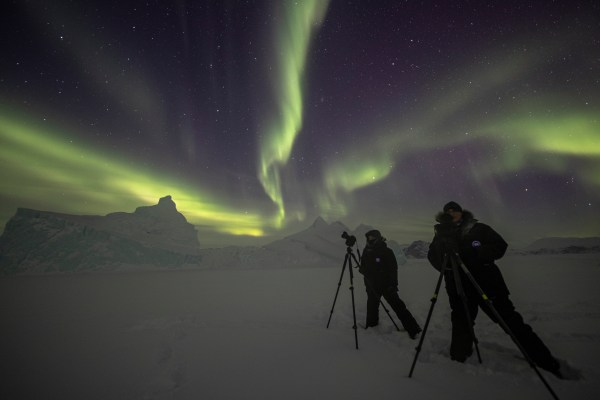 photographers capturing northern lights