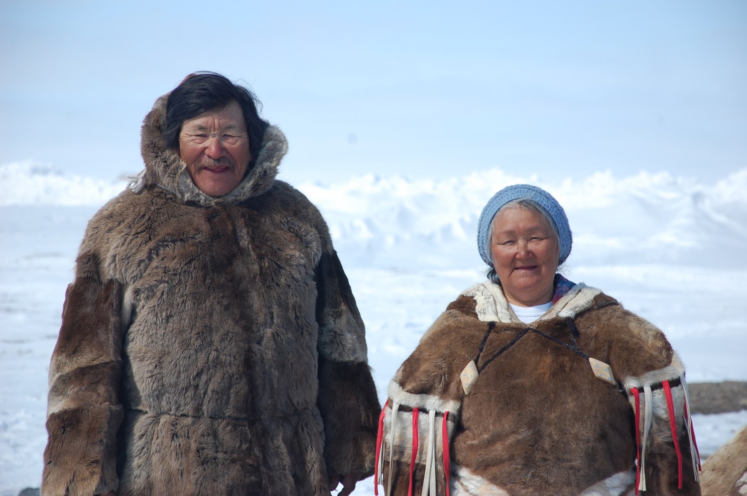 Two Inuit in traditional clothing