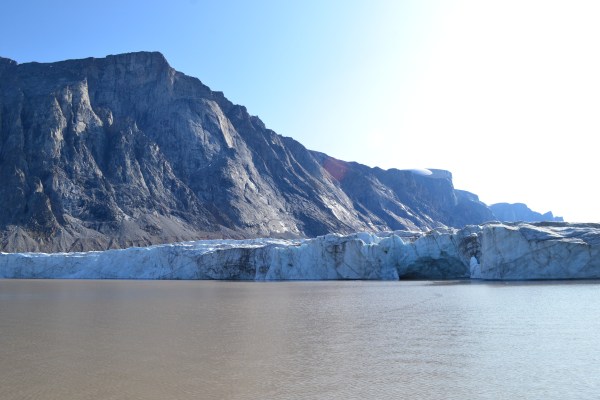 iceberg forming at the bottom of a glacier