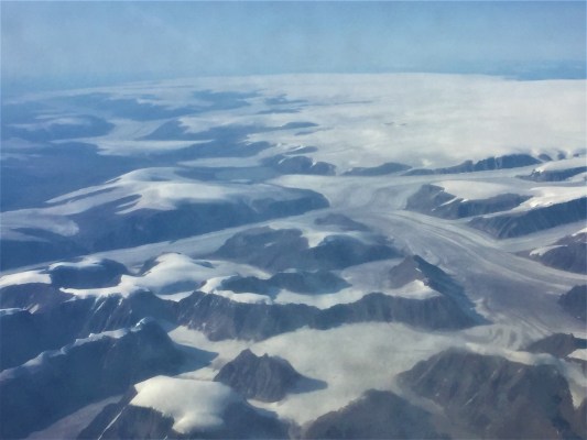 snow accumulates over polar landmasses