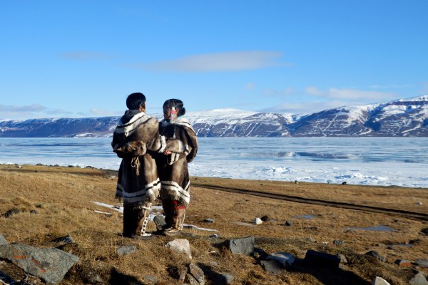 Inuit peoples engaging in throat singing