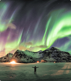 person-stood-front-of-northern-lights